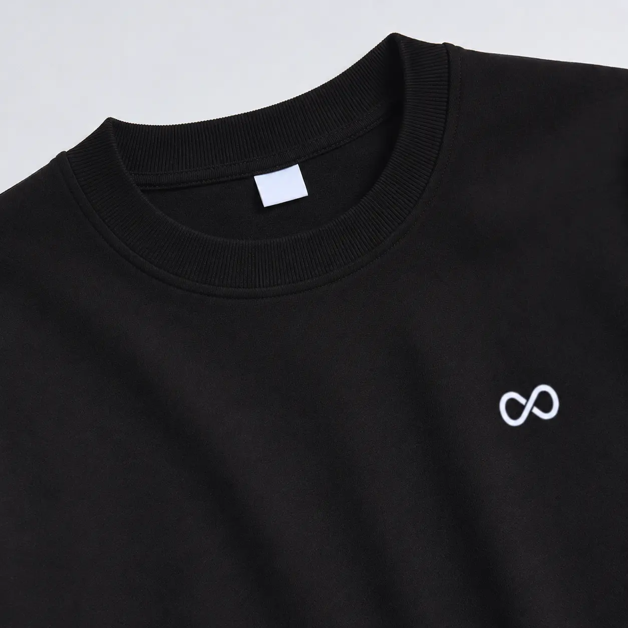 Premium oversized black tee detail