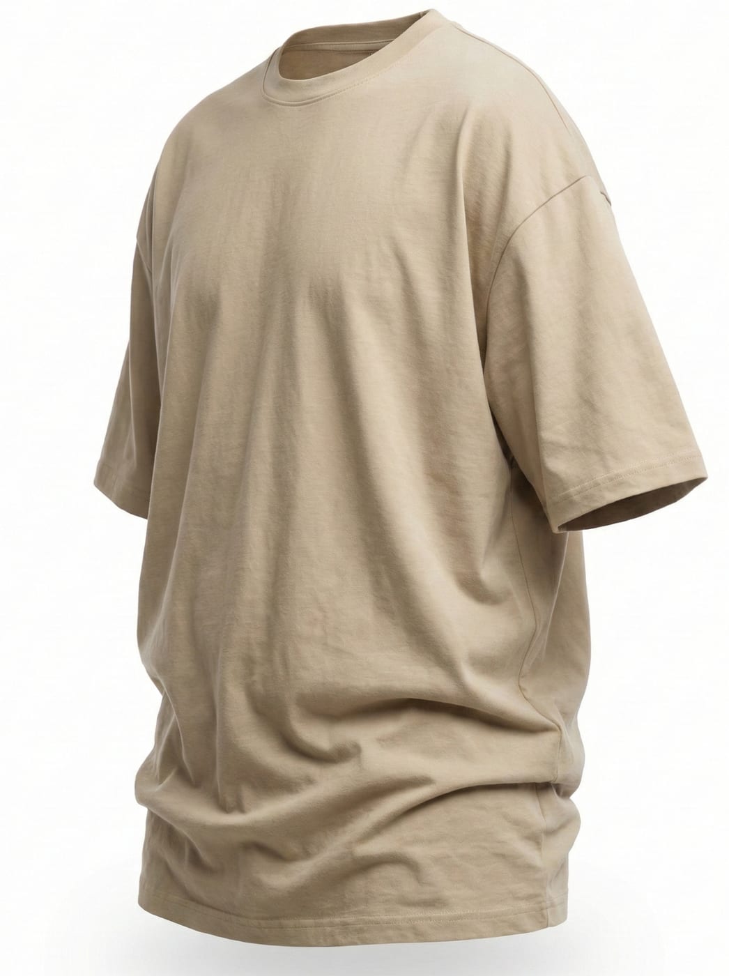 Sand-coloured oversized heavyweight tee in side profile showing the boxy drop-shoulder fit
